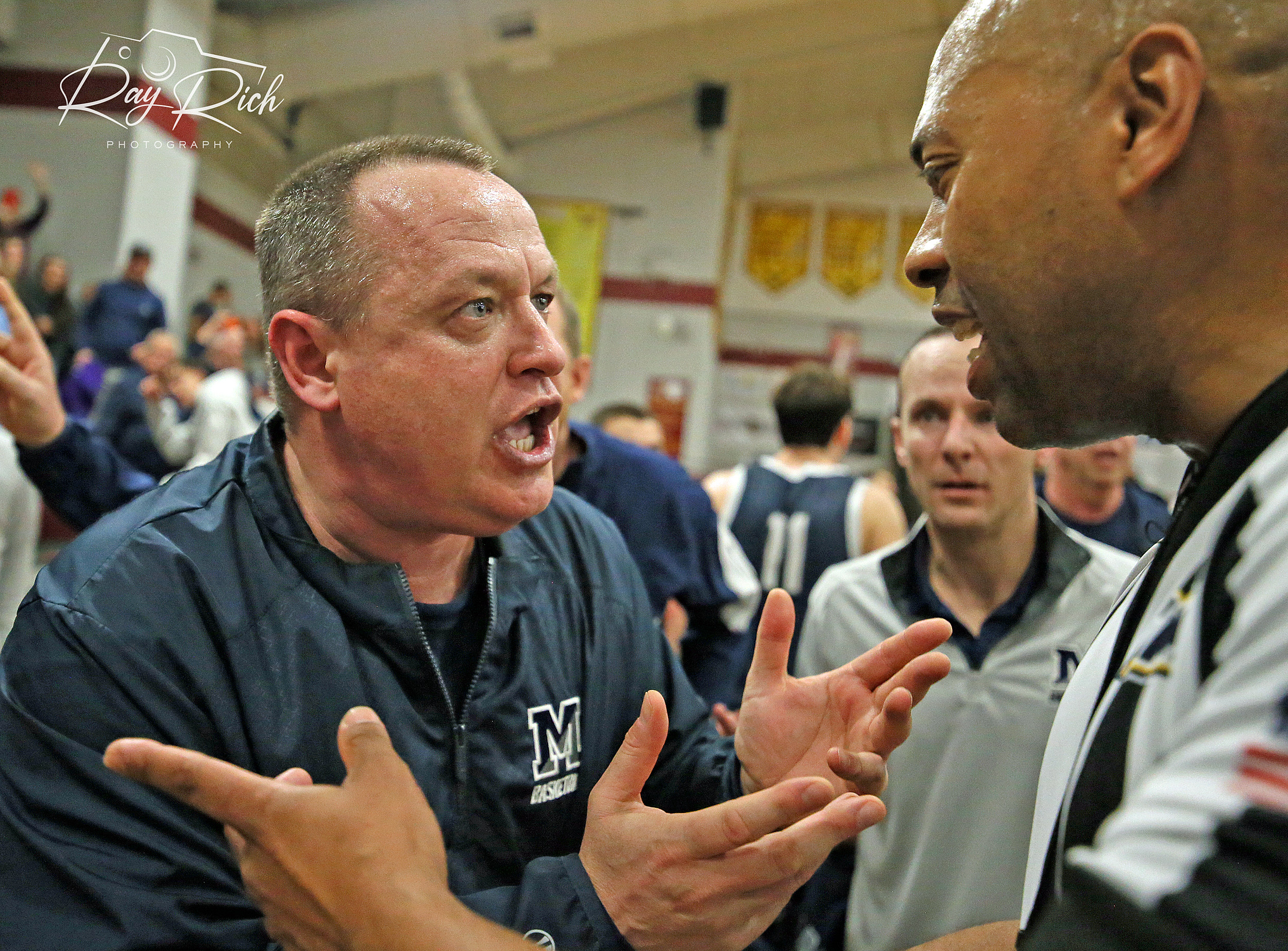 Manasquan coach Andrew Bilodeau pleads his case with one of the officials following the final decision. (Photo by Ray Rich Photography)